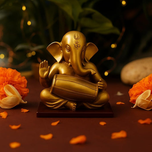 Golden Lord Ganesha Playing Dholak Idol – Resign Ganpati Statue by Kanha Kothi