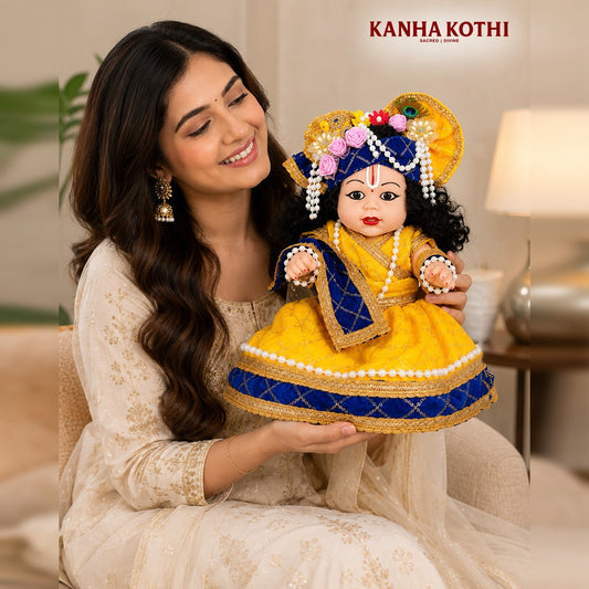 Laddu Gopal Kanha Ji Soft Doll with Peacock Feather Mukut, Blue Pagdi & Yellow Silk Poshak – Pearl Mala Decorative Silicone Idol for Home Mandir & Gifting