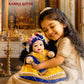 Laddu Gopal Kanha Ji Soft Doll with Peacock Feather Mukut, Blue Pagdi & Yellow Silk Poshak – Pearl Mala Decorative Silicone Idol for Home Mandir & Gifting